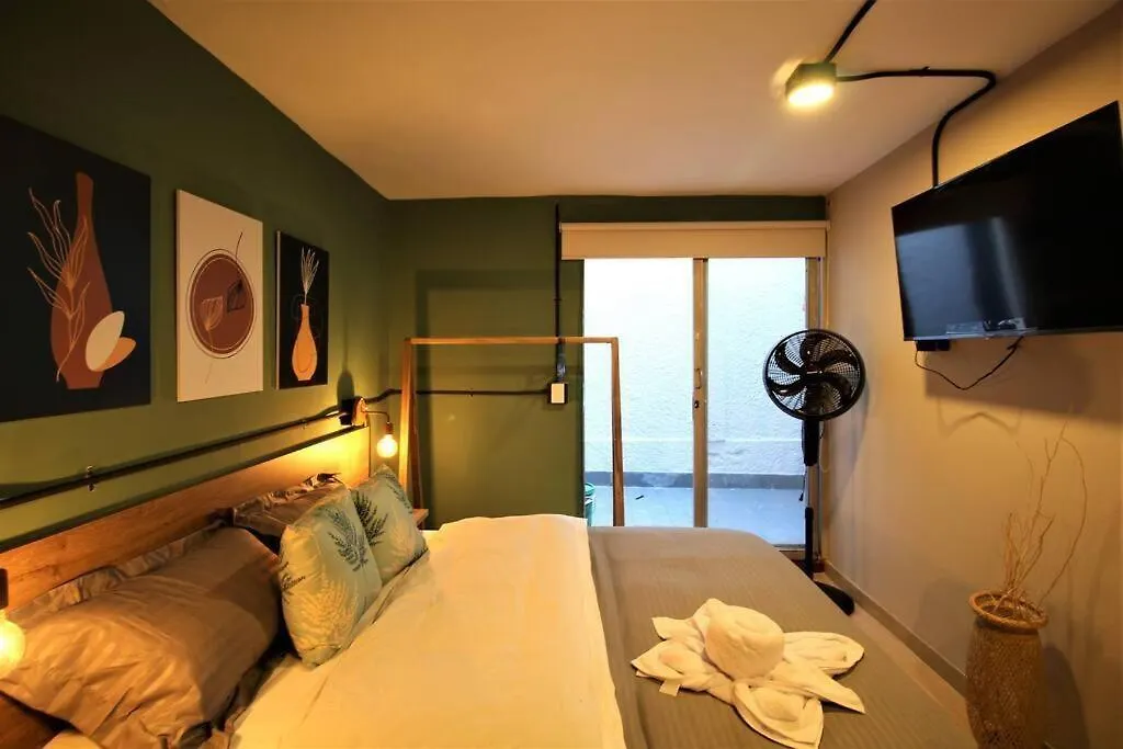Apartamento Privado Con Patio Interno One103 By Roots Rentals联系方式